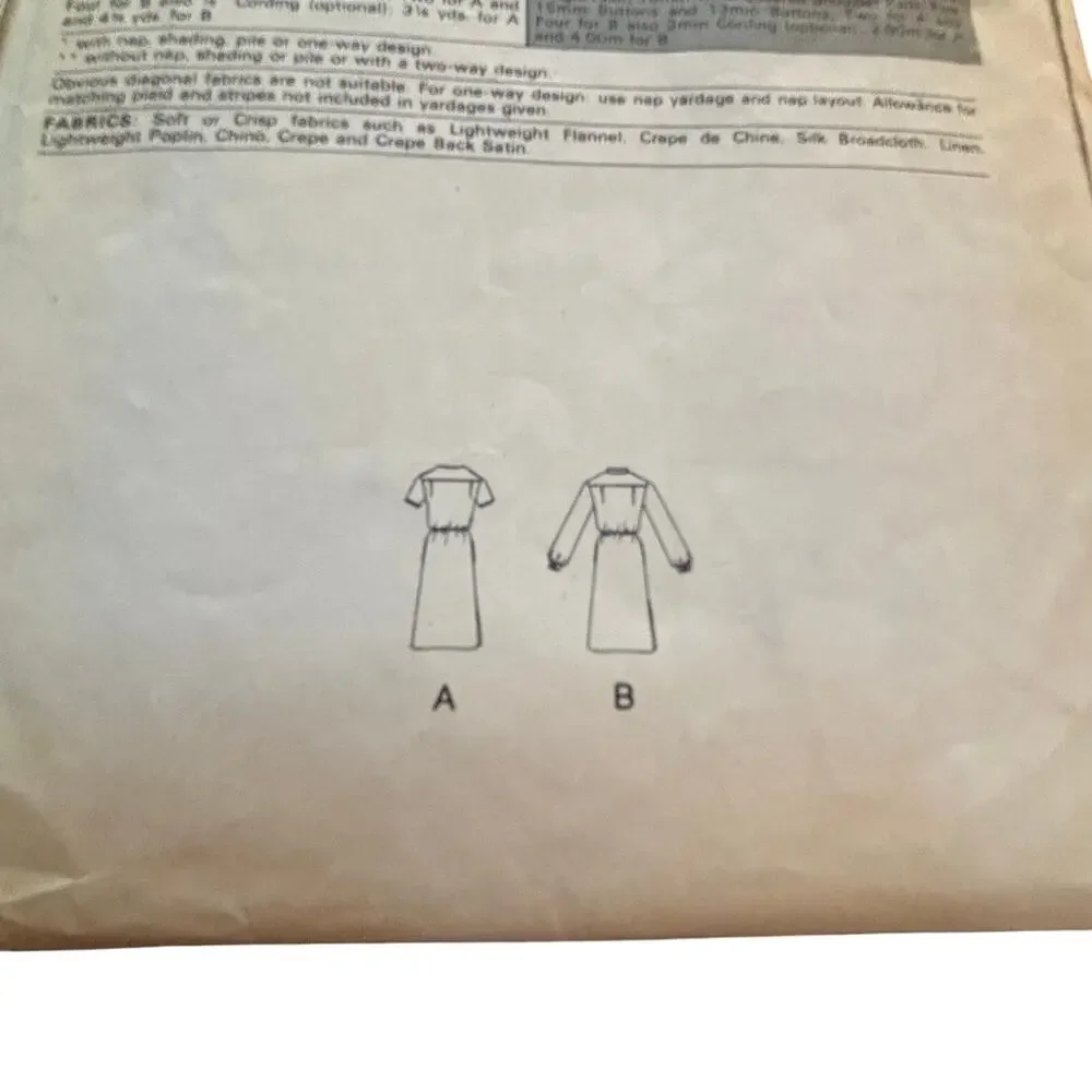 Vintage VOGUE PATTERN #7426 Size 10 sewing instructions uncut 1980s dress
